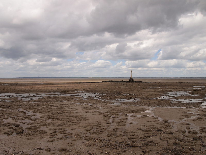 Those lone and level sands...